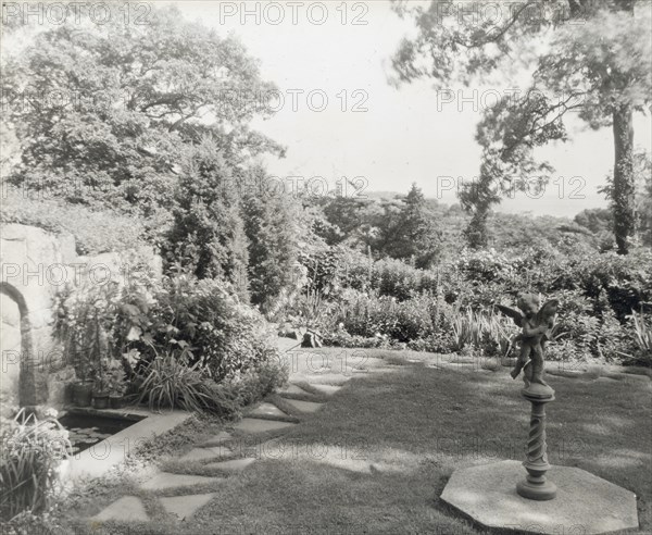 Unidentified house and garden, between 1910 and 1935.