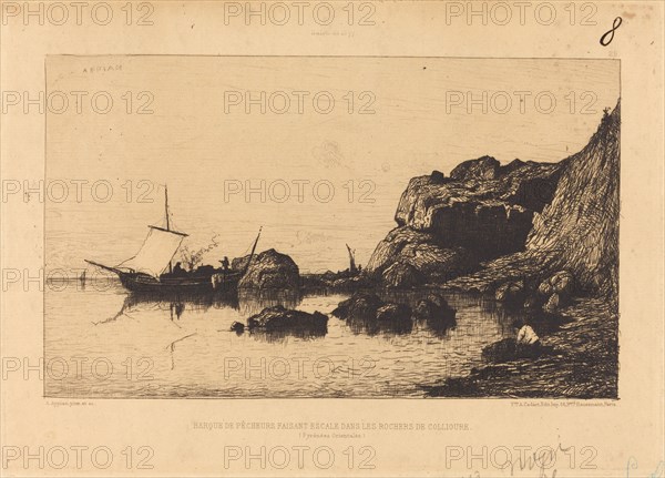 Barque de pecheurs faisant escale dans les rochers de Collioure.