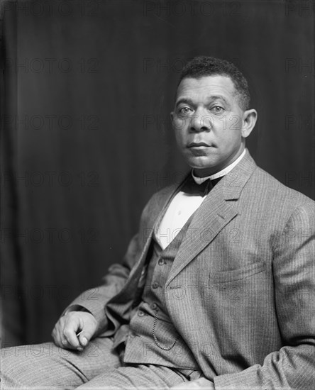 Booker T. Washington, half-length portrait, seated, c1895.