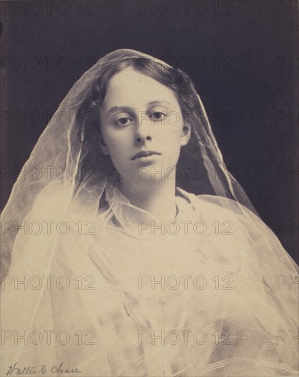 Young woman draped in diaphanous material, facing front, half-length portrait, between 1890 and 1900.