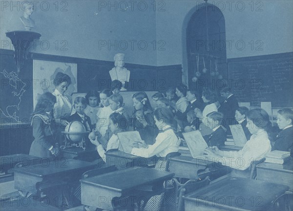 A lesson in globe making. Children in class in a Washington, D.C., school, 1899.