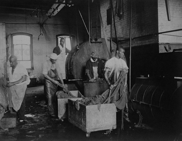 African American workers doing laundry at the Bureau of Engraving & Printing, c1895.