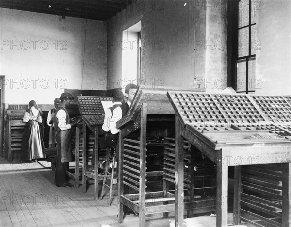 Compositors working in printing shop, Hampton Institute, Hampton, Virginia, 1899 or1900.
