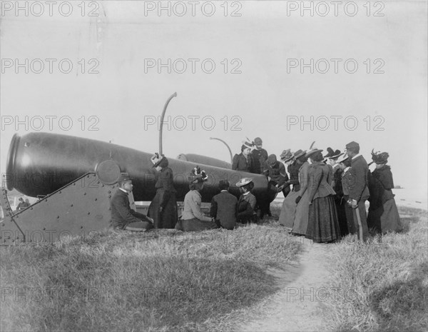 Class from Hampton Institute, Hampton, Va., looking at cannon at Fort Monroe, 1899 or 1900.