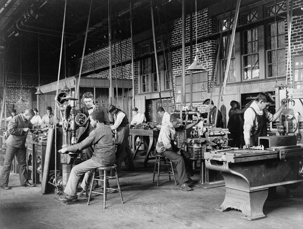 Young men training in use of machinery at Hampton Institute, Hampton, Virginia, 1899 or 1900.