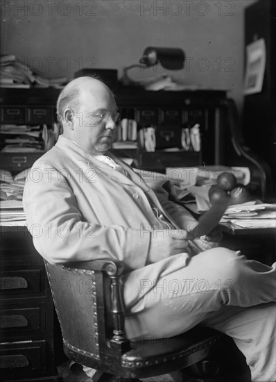 James Carson Needham, Rep. from California - at Desk, 1912. Creator: Harris & Ewing.