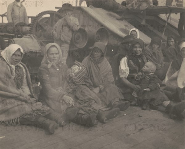 Group of emigrants (women and children) from eastern Europe on deck of the S.S. Amsterdam, 1899.