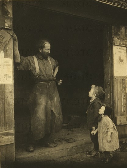 A "crack" with the blacksmith, c1900. Creator: Frances S. Allen.