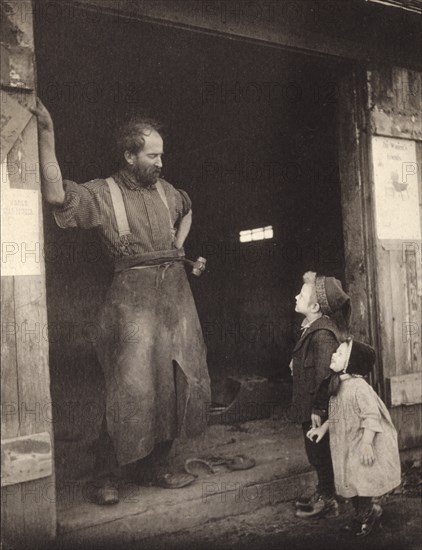 A "crack" with the blacksmith, c1900. Creator: Frances S. Allen.