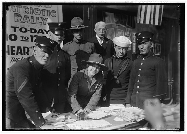 Dora Rodrigues, recruiter for service branches, possibly in front of the Cosmos Theater..., May 1917 Creator: Harris & Ewing.