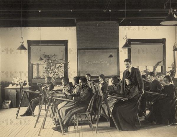 Formal class in liberal arts and sciences Hampton Institute, Hampton, Va. -writing..., 1899 or 1900. Creator: Frances Benjamin Johnston.