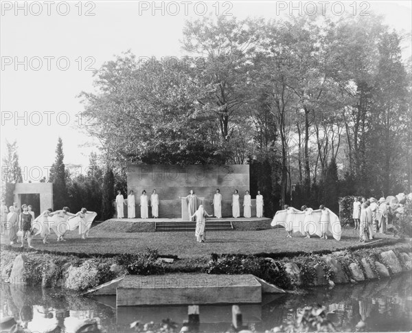 Outdoor dance performance with dancers in classical drapery, possibly in Long Island, between 1900 and 1915.