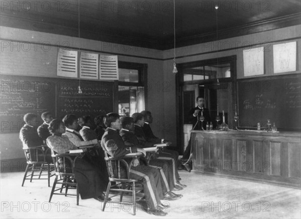 Students in class learning how to prepare sulphuric acid, Hampton Institute, Hampton, Va., between 1899 and 1900.
