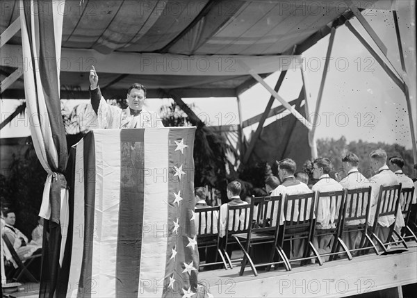 Military Field Mass By Holy Name Soc. of Roman Catholic Church - Father Eugene Del..., 1910. Creator: Harris & Ewing.