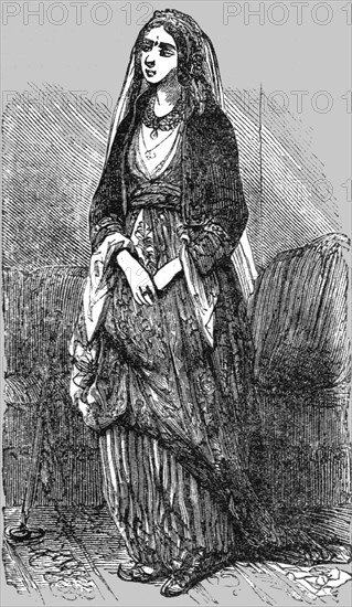 'Woman of Constantinople in-doors; The Women of Turkey', 1854. Creator: Unknown.
