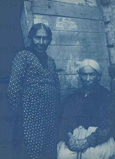 Two Native American women, posed, on Mackinac Island, 1903. Creator: Frances Benjamin Johnston.