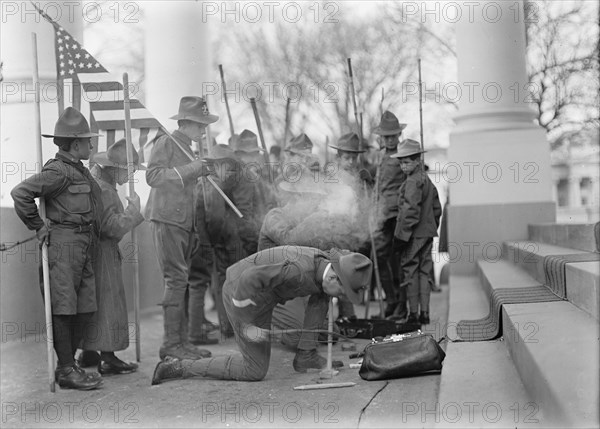 Boy Scouts - Visit of Sir Robert Baden-Powell To D.C. Making Fire, 1911. Creator: Harris & Ewing.