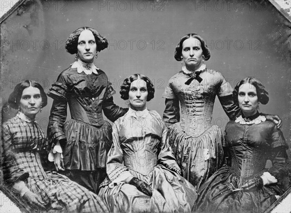 Clark sisters, five women, three-quarter length portraits, all facing front, between 1840 and 1860. Creator: Unknown.