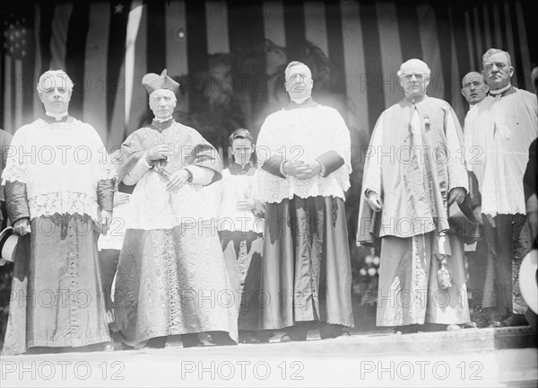 Military Field Mass; Mons. Coleman J. Nevils S.J.; Cardinal Gibbons; Unidentified; Father..., 1912. Creator: Harris & Ewing.