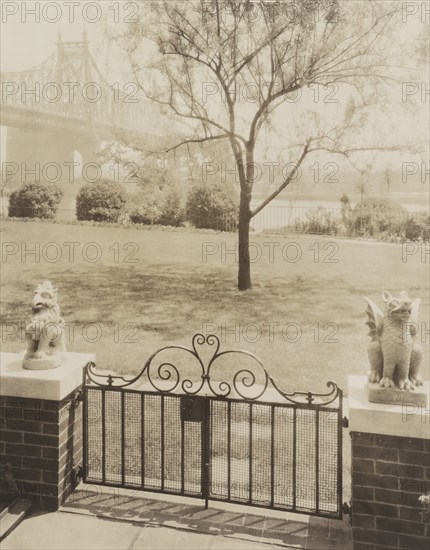 View of Queensborough Bridge from Terrace at home of Miss Anne Morgan, 3 Sutton Pl. NY, 1926. Creator: Frances Benjamin Johnston.