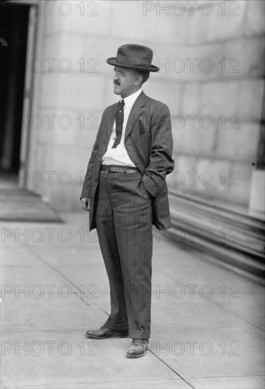 Monorail Subway, Capitol To Senate - Man Who Installed System, 1912. Creator: Harris & Ewing.