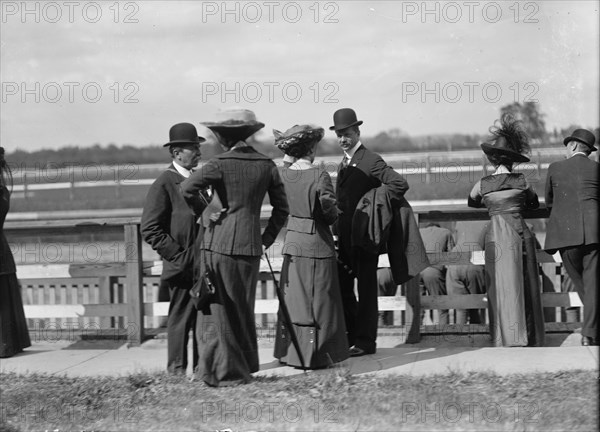 Benning Races - August Belmont; Mrs. Donald Cameron; Sec. Meyer., 1912. Creator: Harris & Ewing.