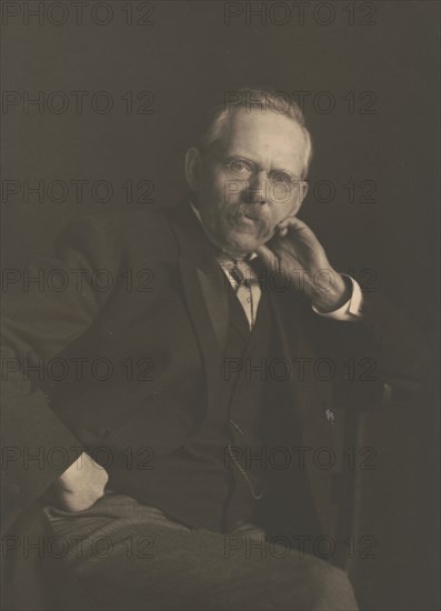 Jacob August Riis, three-quarter length portrait, c1900. Creator: Frances Benjamin Johnston.