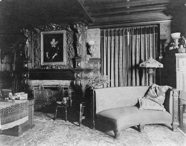 Study with portrait of woman in Elizabethan dress, over fireplace..., Greenwich, Connecticut, 1908. Creator: Frances Benjamin Johnston.