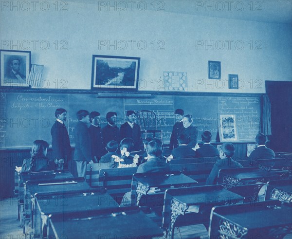 Conversation lesson, subject - the chair, 1901. Creator: Frances Benjamin Johnston.