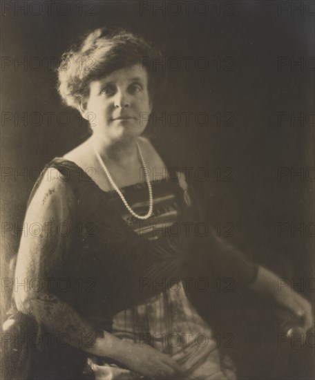 Frances Benjamin Johnston, photographer, posed wearing a pearl necklace..., Palme acade´mique, c1930 Creator: Anthony Bacon.