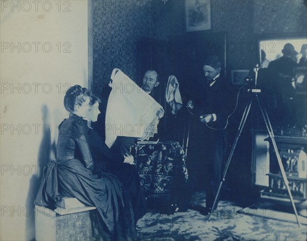 Two unidentified women being photographed, c1890. Creator: Frances Benjamin Johnston.