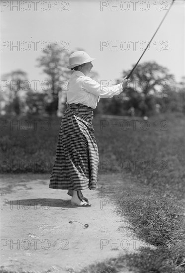 Mrs. L.O. Cameron - Playing Golf, 1913.