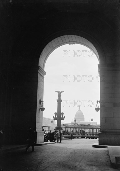 U.S. Capitol - View Through Arch At Union Station, 1917. Washington, DC.