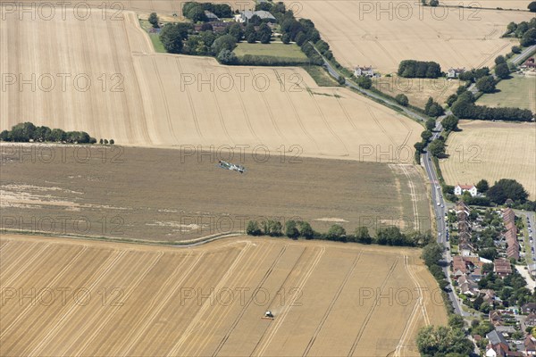 A two seat Spitfire in flight near Goodwood Aerodrome, West Sussex, 2020.