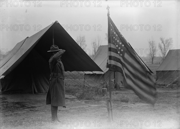 Army, U.S. Negro Troops, 1917. [African American soldier saluting the flag].