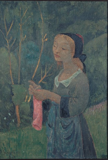 Tricoteuse au bas rose, 1920. Knitter with pink stocking. Young Bretonne woman.