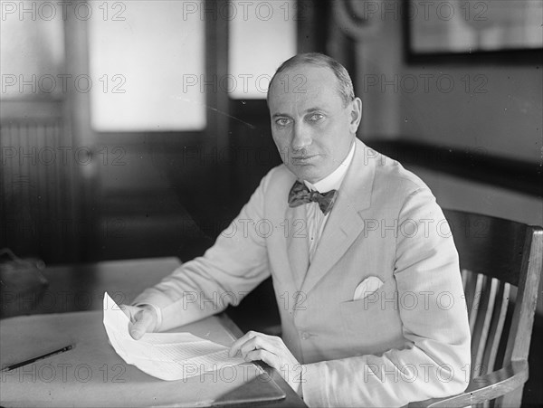 Howard Earle Coffin - At Desk, 1917. American automobile engineer and industrialist.