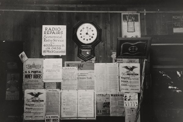 Posters and decorations in combined general store and post office, Olga, Louisiana, 1938-09.