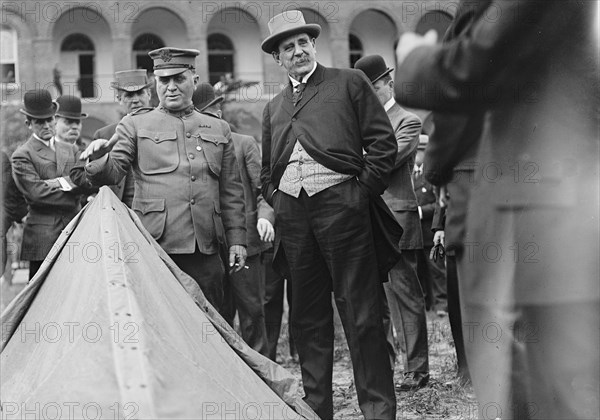 Jacob M. Dickinson, Secretary of War - Inspecting Army Equipment, 1911. Creator: Harris & Ewing.