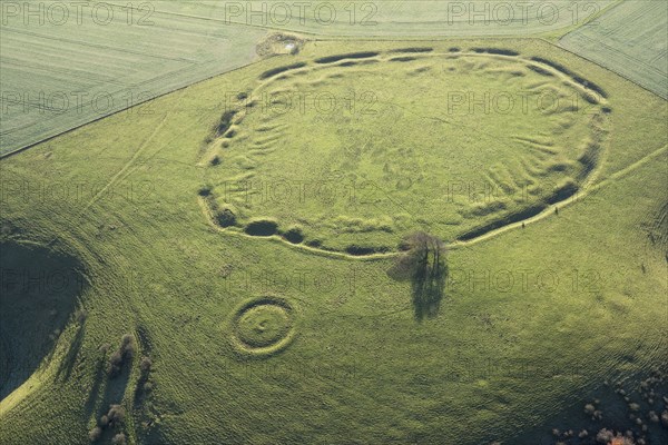 Unfinished Early Iron Age univallate hillfort earthwork situated on Ladle Hill, Hampshire, 2017.