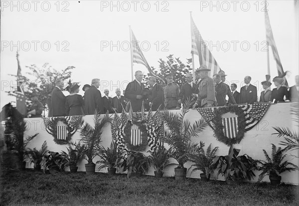 Cavalry Review By President Wilson - Seen In Stand: President Wilson; General Wood; Col..., 1913. Creator: Harris & Ewing.