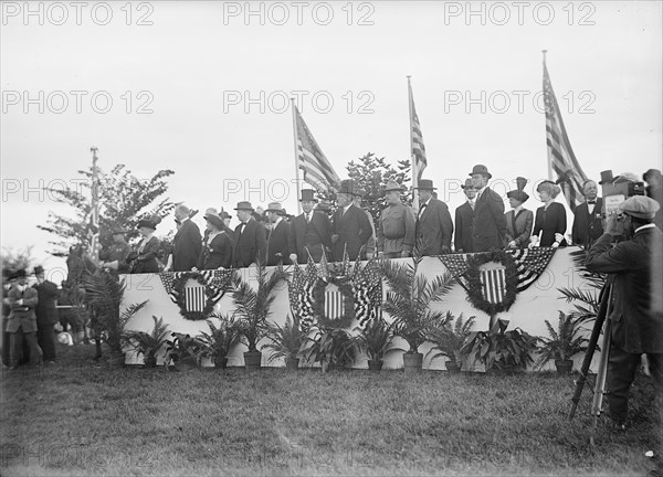 Cavalry Review By President Wilson - Seen In Stand: President Wilson; General Wood; Col..., 1913. Creator: Harris & Ewing.