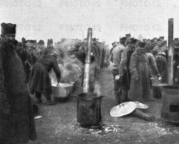 'Aux Camps Serbes (Soldats et refugies civils) de Salonique; les cuisines des detchements...', 1916. Creator: Hubert Jacques.