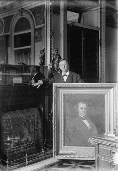 Daniels, Josephus, Secretary of The Navy, 1913-1921 with Painting of Secretary of The Navy George E. Badger, 1913.