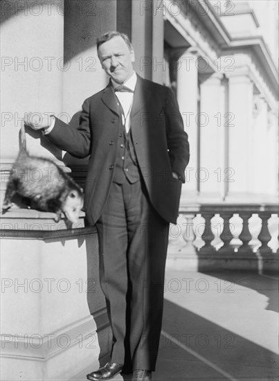 Daniels, Josephus, Secretary of The Navy, 1913-1921. with An Opossum, 1913.