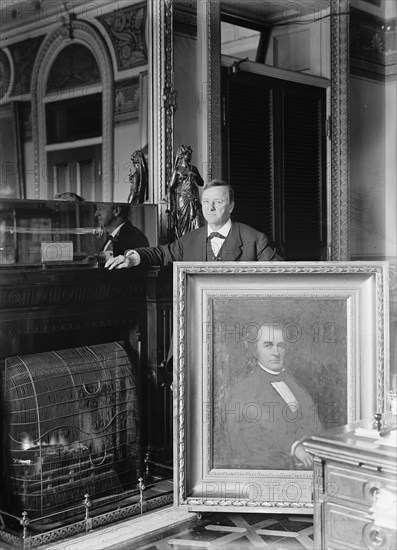 Daniels, Josephus, Secretary of The Navy, 1913-1921. with Painting of Secretary of The Navy George E. Badger, 1913.