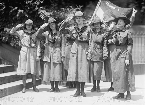 Girl Scouts - Troop #1. Mrs. Juliette Low, Founder, Right; Elenore Putsske, Center; Evaline..., 1917 Creator: Harris & Ewing.