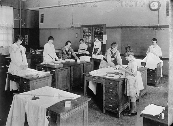 Girl Scouts - War Sewing with Red Cross, 1917.