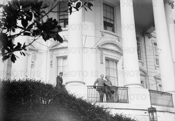 Hughes, William, Rep. from New Jersey, 1903-1912; Senator, 1913-1918. with Wilson, Watching..., 1913 Creator: Harris & Ewing.