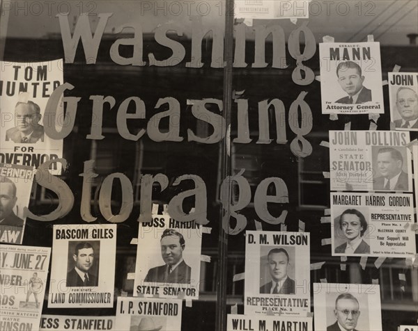 Campaign posters in garage window, just before the primary. Waco, Texas,  1938-06.